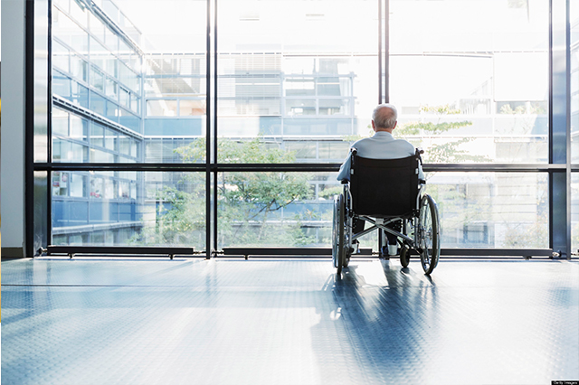 Elderly man in wheelchair