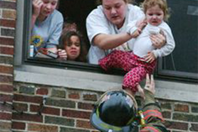 Fireman saving child