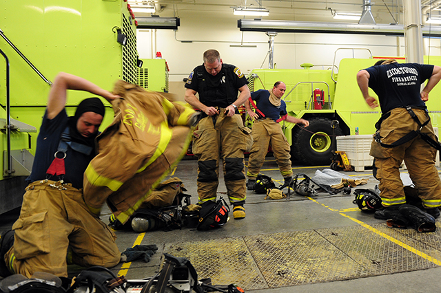 Firefighter suiting up