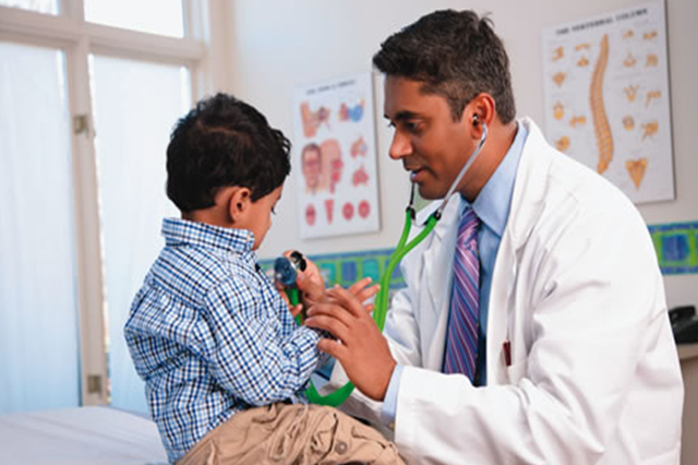 Doctor with little boy