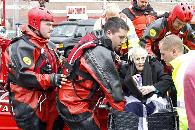 EMT saves elderly lady
