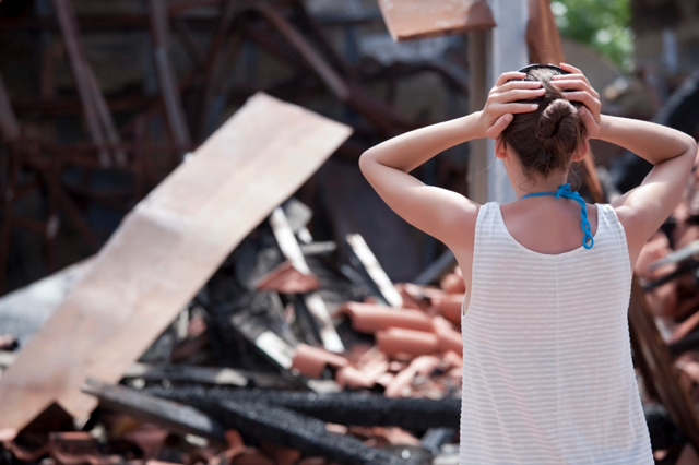 Woman after home destoyed